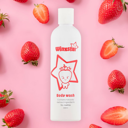 Winxsta Kids body wash 300ml - white bottle with cute strawberry character and star shown on the front. Bottle surrounded by red strawberries.