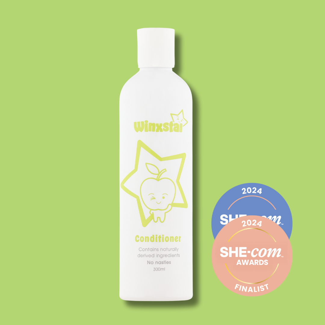 Winxsta Kids conditioner 300ml - white bottle with cute apple character and star shown on the front. 